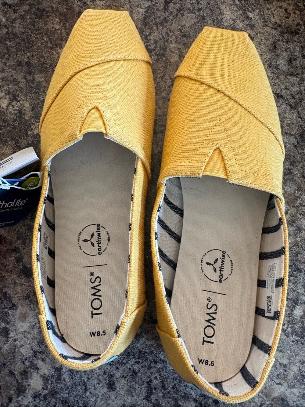 TOMS Women's Canvas Slip-On Flats in Yellow